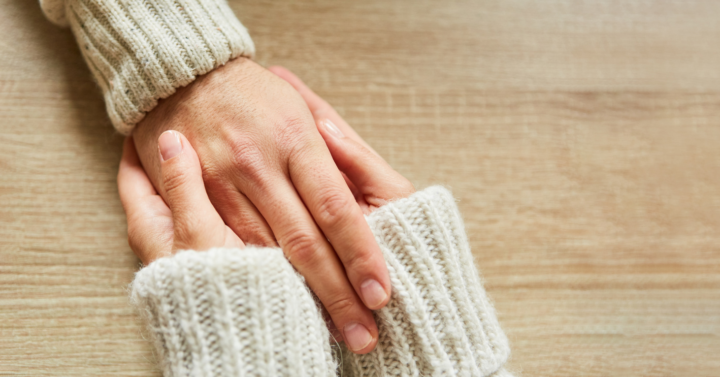 Hands Holding for Consolation and Care